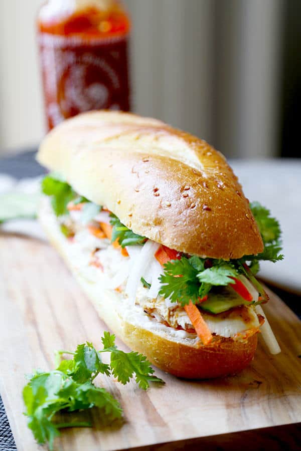 Chicken Banh Mi Sandwich Recipe - Making a Vietnamese Banh Mi Sandwich at home is easier you think! This quick Banh Mi recipe has authentic flavor and only takes 25 minutes to make. Recipe, sandwich, Vietnamese, lunch, chicken sandwich, healthy, dinner | pickledplum.com
