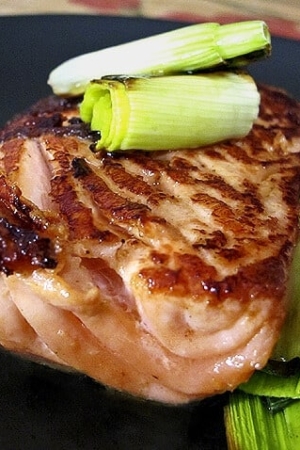 roasted piece of salmon with leeks