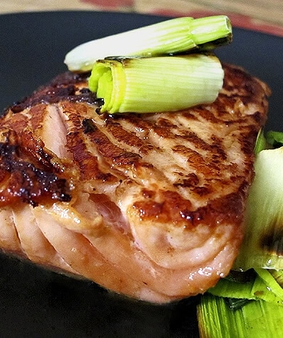 roasted piece of salmon with leeks