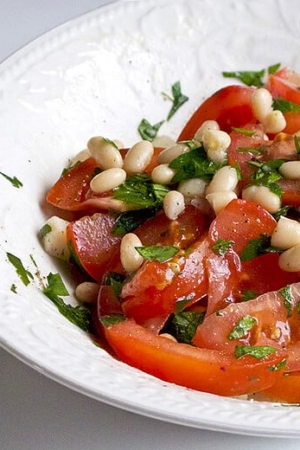 bowl of tomato and bean salad
