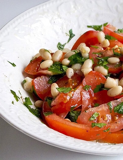 bowl of tomato and bean salad