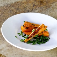 plate of sliced cooked carrots