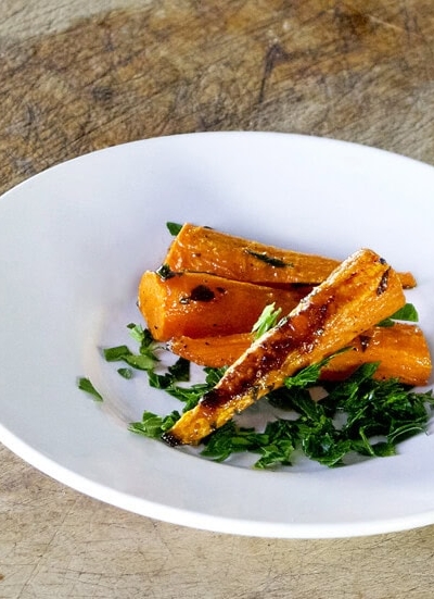 plate of sliced cooked carrots