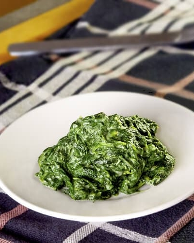 creamed spinach on a plate