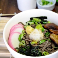 Japanese soba noodles with fish cakes and shiitake mushrooms