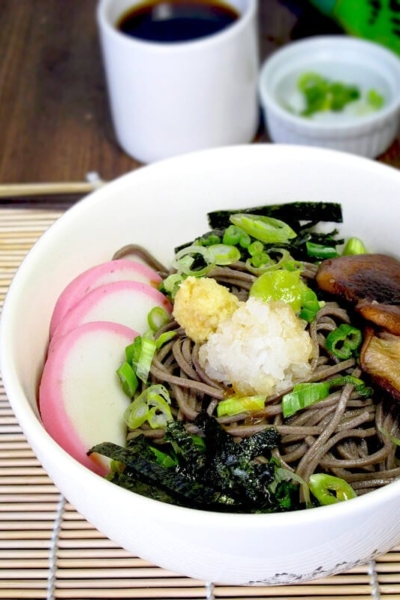 Japanese soba noodles with fish cakes and shiitake mushrooms