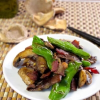 sauteed shishito peppers with mushrooms and bacon