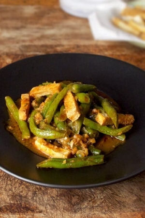plate of fried tofu with green beans