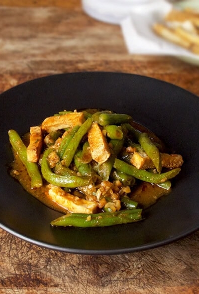 plate of fried tofu with green beans