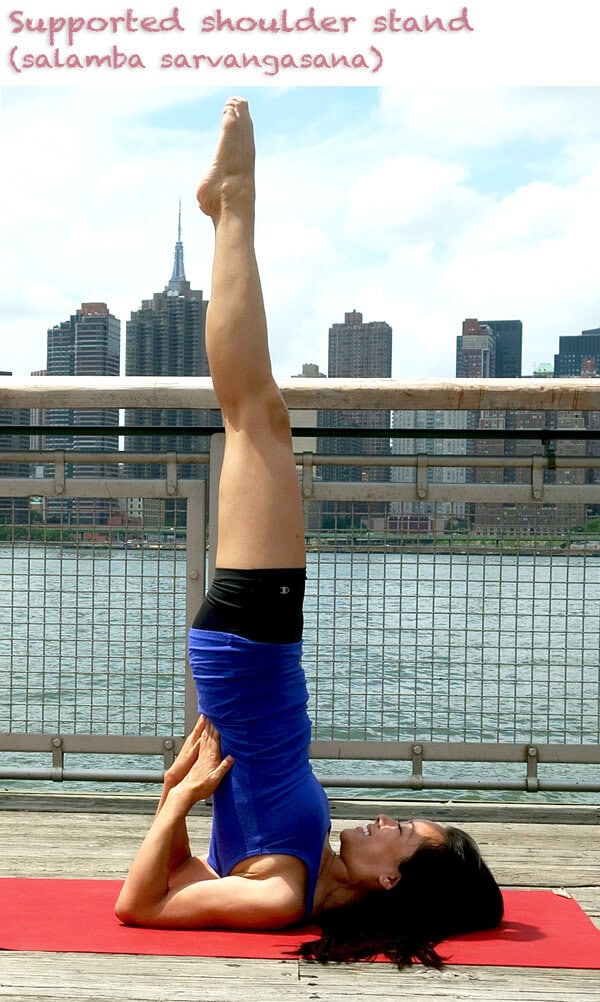 Yoga wheel: supported shoulder stand (salamba sarvangasana