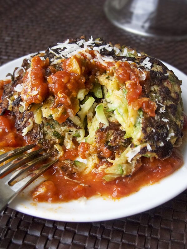 zucchini cakes with parmesan and tomato sauce