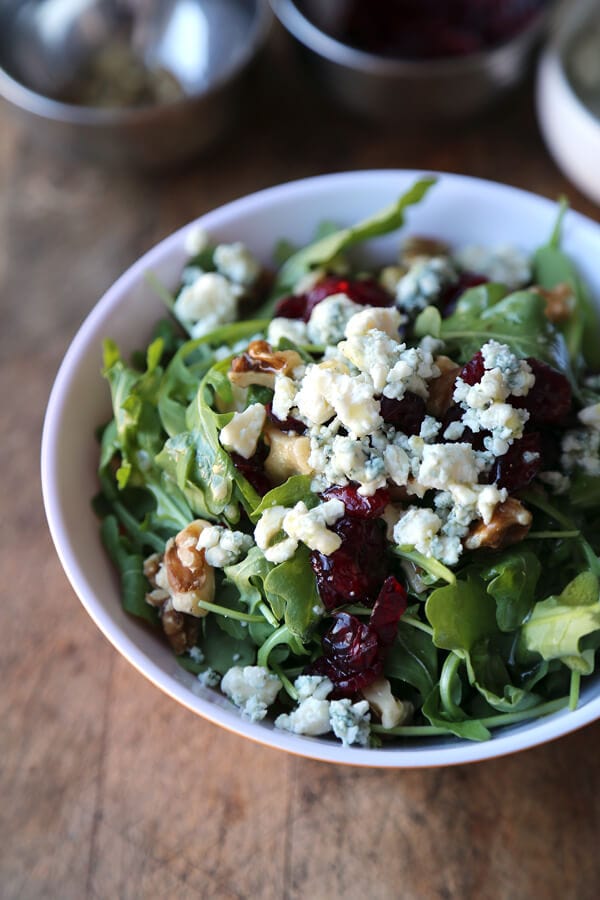 Arugula salad with walnuts, blue cheese and cranberries  Pickled Plum Food And Drinks