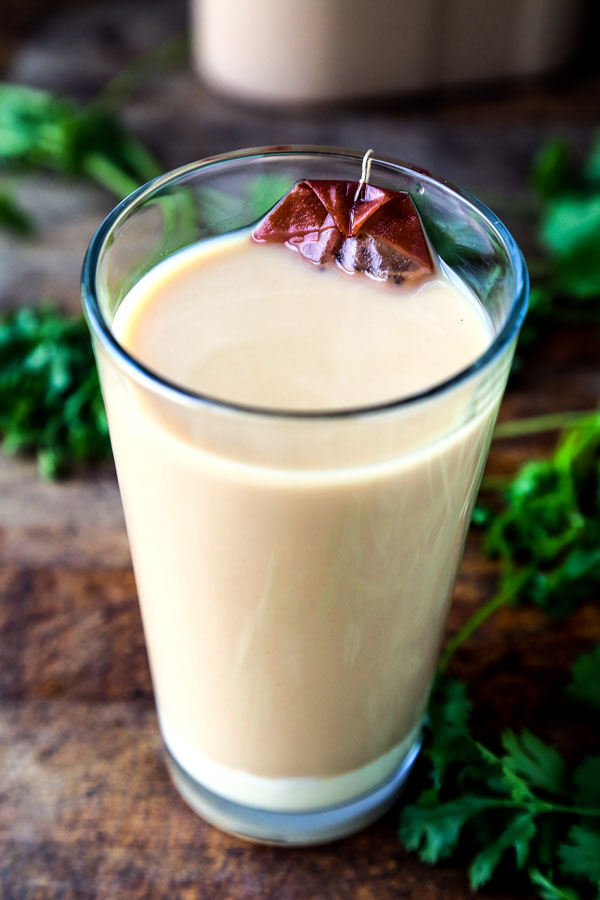 Thai Iced Tea Recipe - My favorite orange-colored tea! Thai iced tea is sweet, creamy and oh so refreshing! No wonder why it's become such an iconic summer drink and the good news is, it's very easy to make! #icedtea #beverage #summerdrink #thairecipe | pickledplum.com