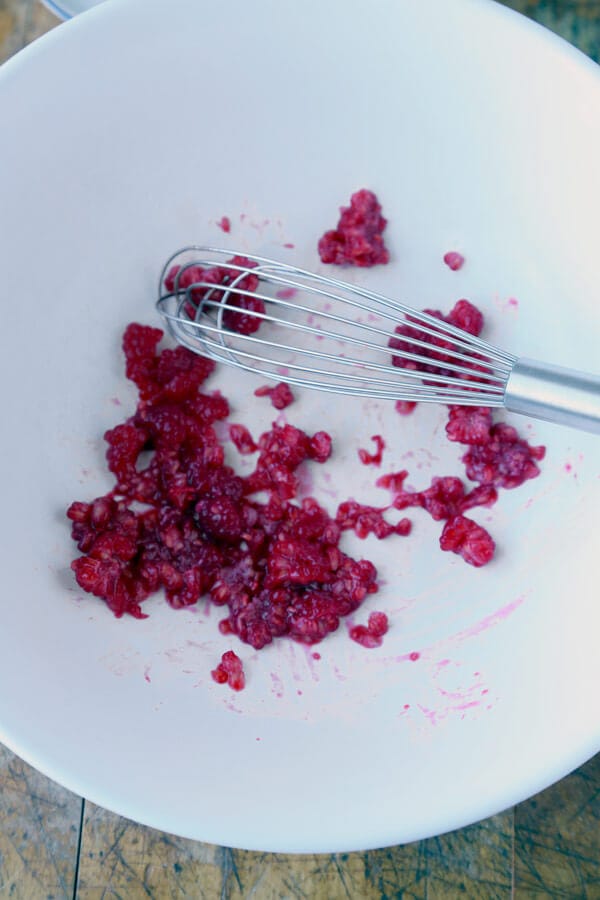 mashing-raspberries