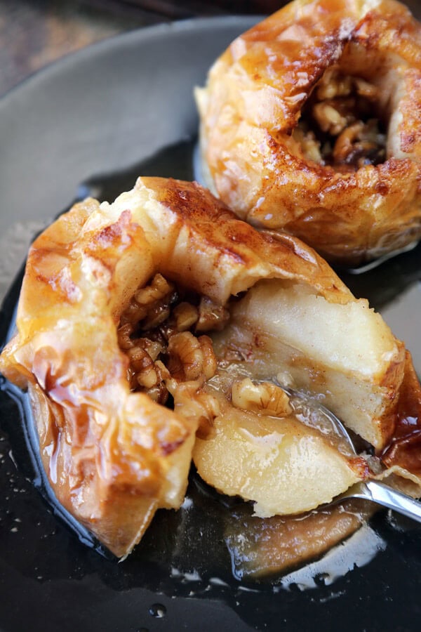 These sweet and tart baked apples with walnuts and cider will change the way you see healthy desserts! And prepping only takes five minutes!