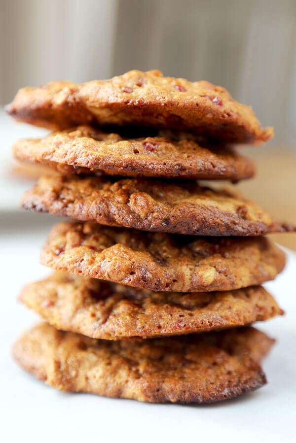 Gluten-free goodness! Chewy, sweet and fruity, these gluten-free peanut butter and raspberry jam cookies are so good you won't be able to stop at just one! #glutenfreecookies #glutenfreerecipes #flourless #homemadecookies | pickledplum.com