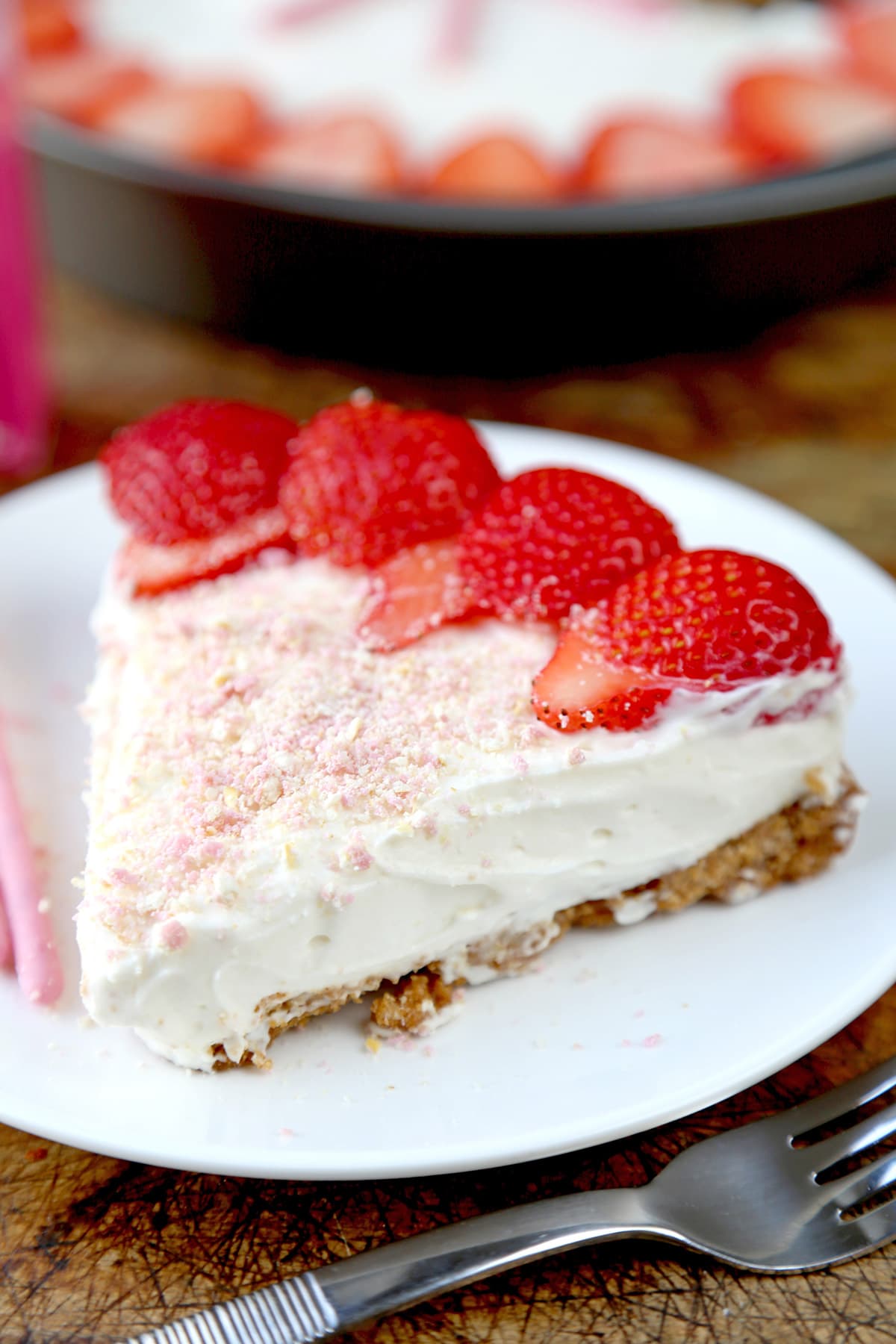 Slice of strawberry Pocky cheesecake