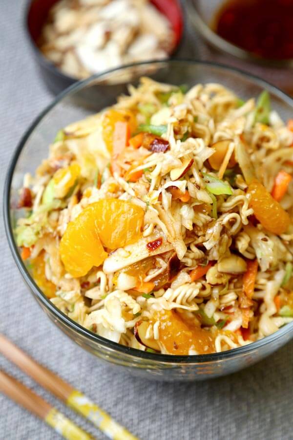 Ramen Noodle Coleslaw - This is an easy ramen noodle salad recipe with cabbage, mandarin oranges, slivered almonds and crunchy ramen noodles, tossed in an oriental dressing that's sweet and tangy. Yummy! #saladrecipe #asiansalad #ramennoodles| pickledplum.com