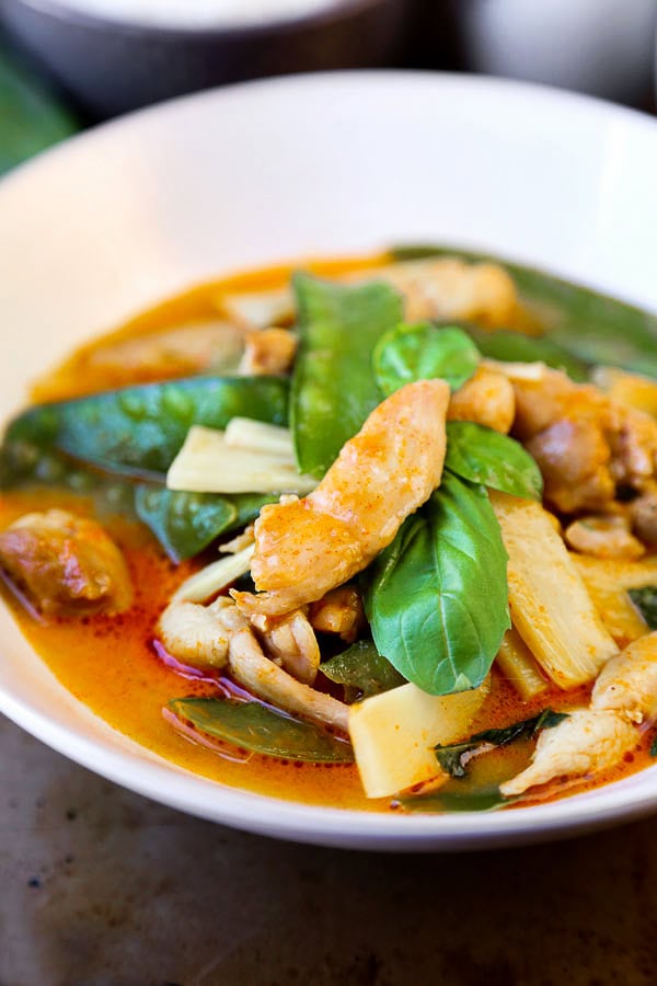 Thai Red Chicken Curry - an authentic thai coconut curry recipe that's easy and healthy! Make it spicy (or not) and add your favorite ingredients. I've added chicken, bamboo and snow peas. Delicious! #thaifood #curryrecipe #asianrecipes #chickenrecipes #currypaste pickledplum.com