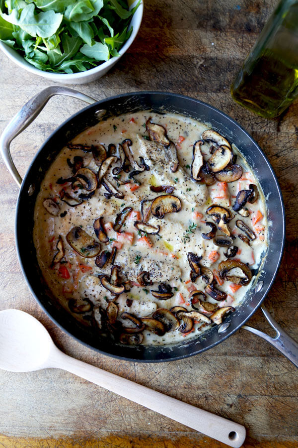 Simple and rustic Cream Of Mushroom Chicken with chopped carrots, fresh mushrooms & thyme. Family friendly and ready in under 20 minutes!