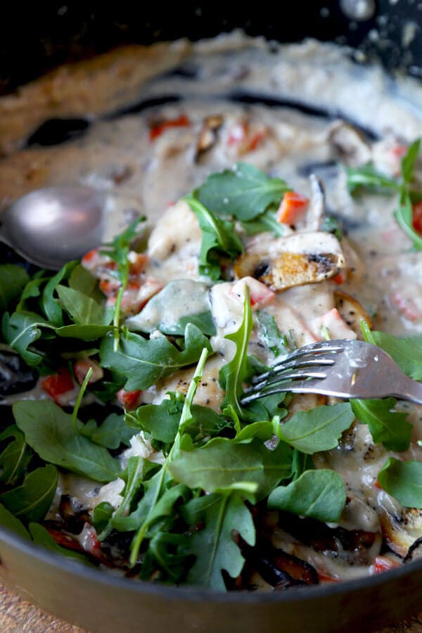 Simple and rustic Cream Of Mushroom Chicken with chopped carrots, fresh mushrooms & thyme. Family friendly and ready in under 20 minutes!