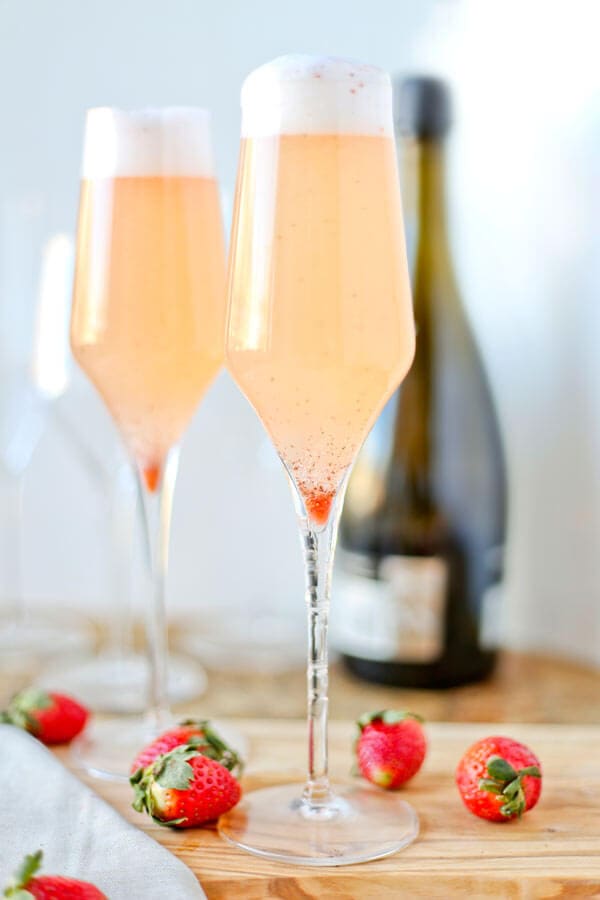 Strawberry-Thyme Prosecco Floats - These strawberry-thyme prosecco floats are such a treat! Sweet and a little tart, and with hints of citrus and herbs, they taste like a refreshing fruity dessert in a glass! | pickledplum.com