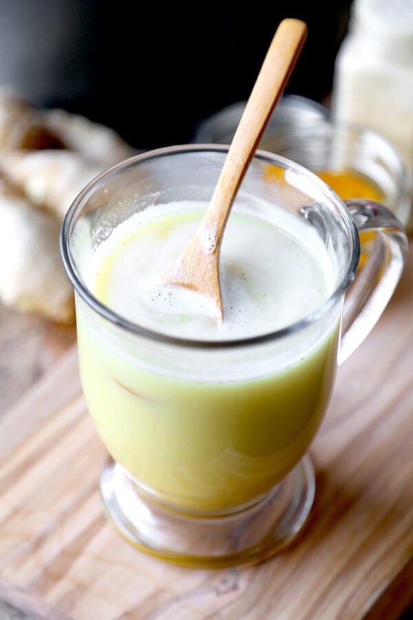 Honey Ginger and Turmeric Latte - This spicy honey, ginger and turmeric latte is the perfect beverage to soothe a sore throat, achy head and stuffed up nose. Drink | pickledplum.com