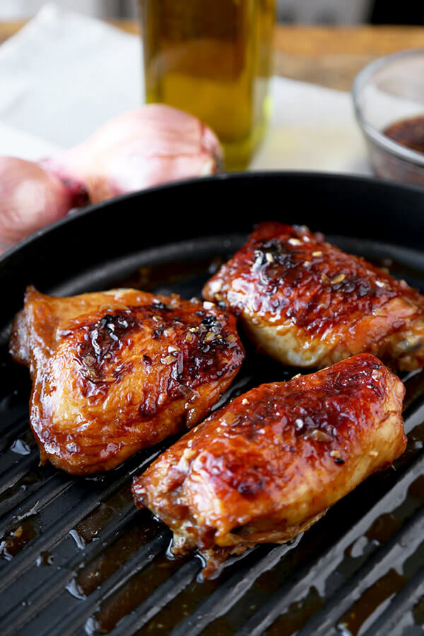 Baked Chicken Thighs with Soy Marinade - Moist and tender baked chicken thighs with a simple soy and honey marinade - less than 10 minutes to prep and simply delicious! Easy, chicken, recipe | pickledplum.com