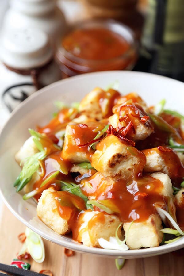 General Tso Tofu - Better than takeout General Tso tofu with a sweet, savory and slightly spicy glaze. Ready in 20 minutes from start to finish. Impossible to resist! Healthy, easy, tofu recipe | pickledplum.com