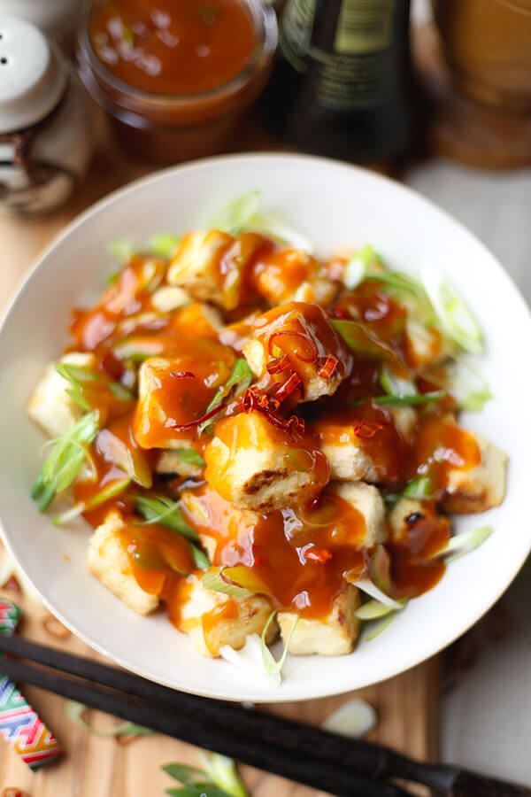 General Tso Tofu - Better than takeout General Tso tofu with a sweet, savory and slightly spicy glaze. Ready in 20 minutes from start to finish. Impossible to resist! Healthy, easy, tofu recipe | pickledplum.com