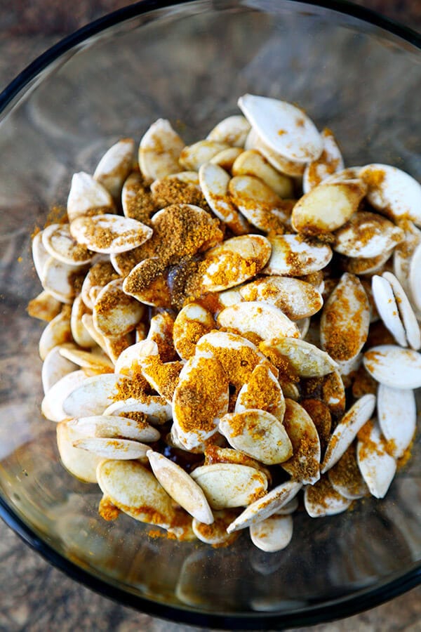 Spiced Roasted Pumpkin Seeds - These spiced roasted pumpkin seeds are sweet, salty and packed with nutrients. Whether it's fall, winter, spring or summer, they are the perfect, healthy mid afternoon snack! Healthy, vegetarian, gluten free | pickledplum.com