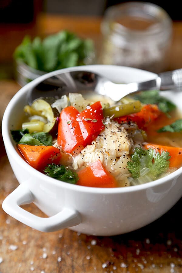 slow-cooker-chicken-soup - Slow Cooker Chicken Soup - This simple slow cooker chicken soup is packed with veggies and simmered in a light and delicate chicken stock. It's low in calories and fat and only takes 10 minutes to prep. Gluten free, weight loss. | pickledplum.com