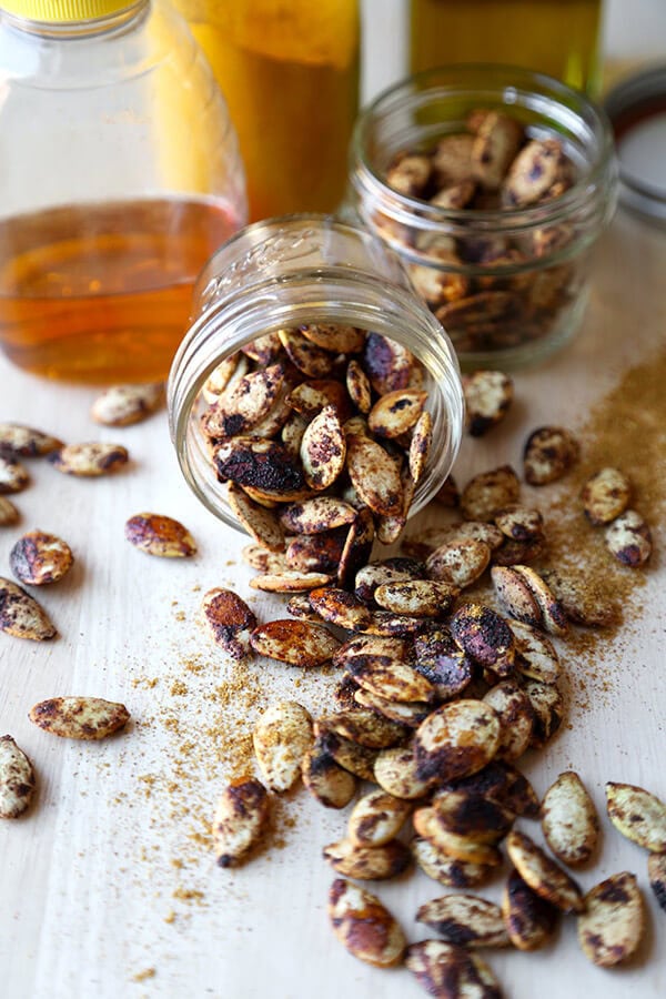 Spiced Roasted Pumpkin Seeds - These spiced roasted pumpkin seeds are sweet, salty and packed with nutrients. Whether it's fall, winter, spring or summer, they are the perfect, healthy mid afternoon snack! Healthy, vegetarian, gluten free | pickledplum.com