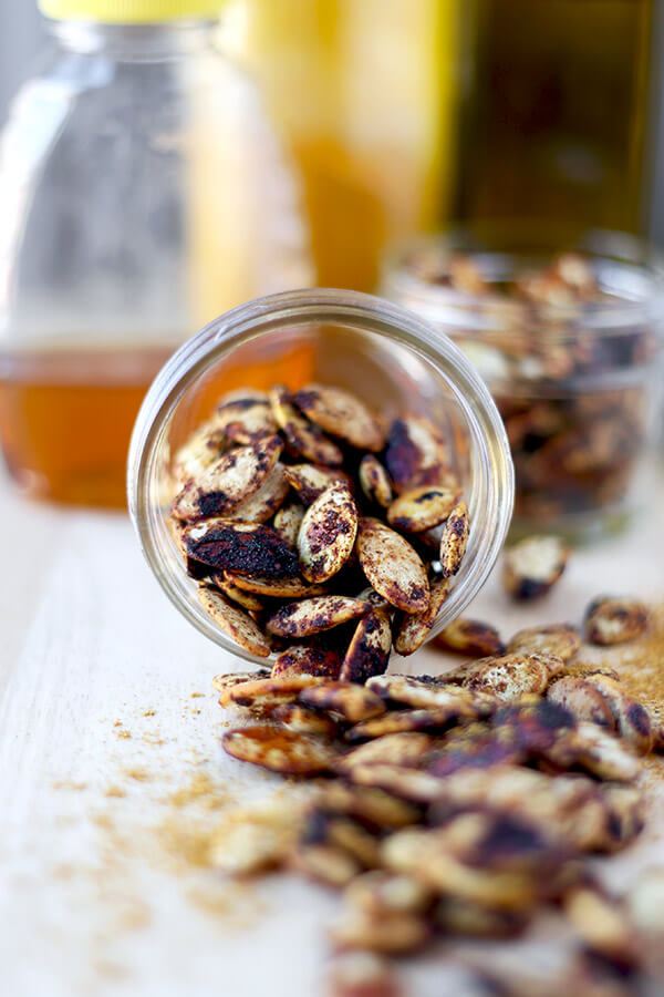 Spiced Roasted Pumpkin Seeds - These spiced roasted pumpkin seeds are sweet, salty and packed with nutrients. Whether it's fall, winter, spring or summer, they are the perfect, healthy mid afternoon snack! Healthy, vegetarian, gluten free | pickledplum.com
