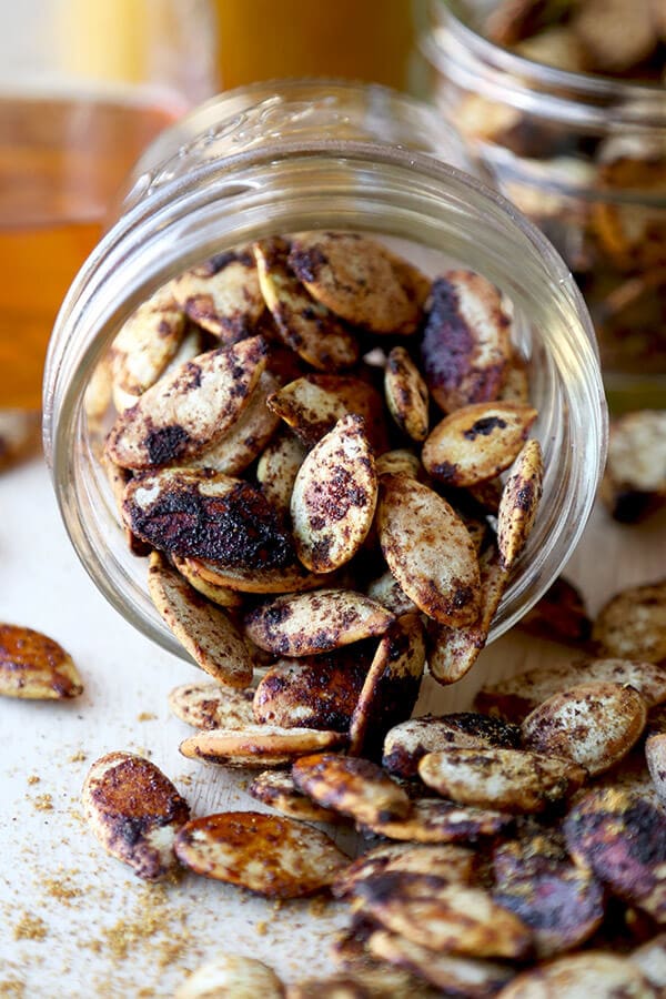 Spiced Roasted Pumpkin Seeds - These spiced roasted pumpkin seeds are sweet, salty and packed with nutrients. Whether it's fall, winter, spring or summer, they are the perfect, healthy mid afternoon snack! Healthy, vegetarian, gluten free | pickledplum.com