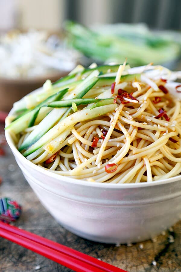 Cold Asian Noodle Salad - This is a quick and easy, spicy and nutty cold Asian noodle salad your whole family will love! Perfect for a barbecue or as a light lunch or dinner + ready in just 15 minutes! Recipe, Easy, Noodles, Healthy, Salad, Vegetarian, Vegan | pickledplum.com