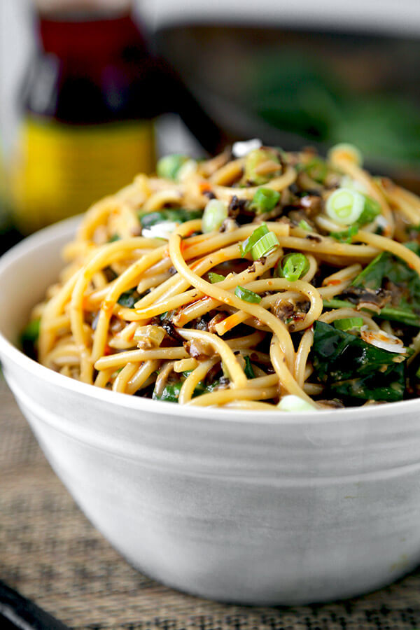 Vegan Dan Dan Noodles - This is a vegan recipe for dan dan noodles you won't be able to stop eating! Chopped mushrooms replace the ground meat and bring earthiness to this spicy, nutty and tangy noodle dish. Yummy! Chinese, Noodles, Easy, Recipe, Vegan | pickledplum.com