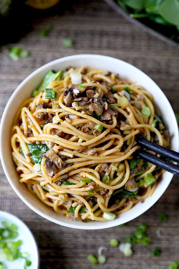 Vegan Dan Dan Noodles - This is a vegan recipe for dan dan noodles you won't be able to stop eating! Chopped mushrooms replace the ground meat and bring earthiness to this spicy, nutty and tangy noodle dish. Yummy! Chinese, Noodles, Easy, Recipe, Vegan | pickledplum.com