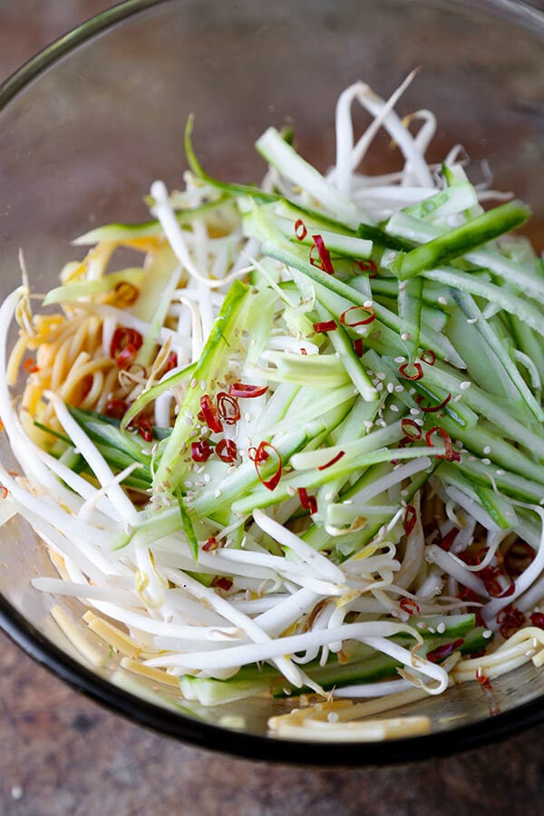 Cold Asian Noodle Salad - This is a quick and easy, spicy and nutty cold Asian noodle salad your whole family will love! Perfect for a barbecue or as a light lunch or dinner + ready in just 15 minutes! Recipe, Easy, Noodles, Healthy, Salad, Vegetarian, Vegan | pickledplum.com