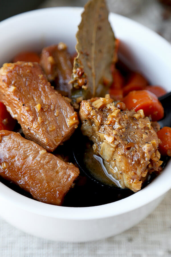 Pork Adobo Recipe - This is a pork adobo recipe that's assertive in tangy and sour flavors. The addition of carrots elevates the dish as they soak up all that adobo goodness! Easy, Pork, Filipino, Recipe | pickledplum.com