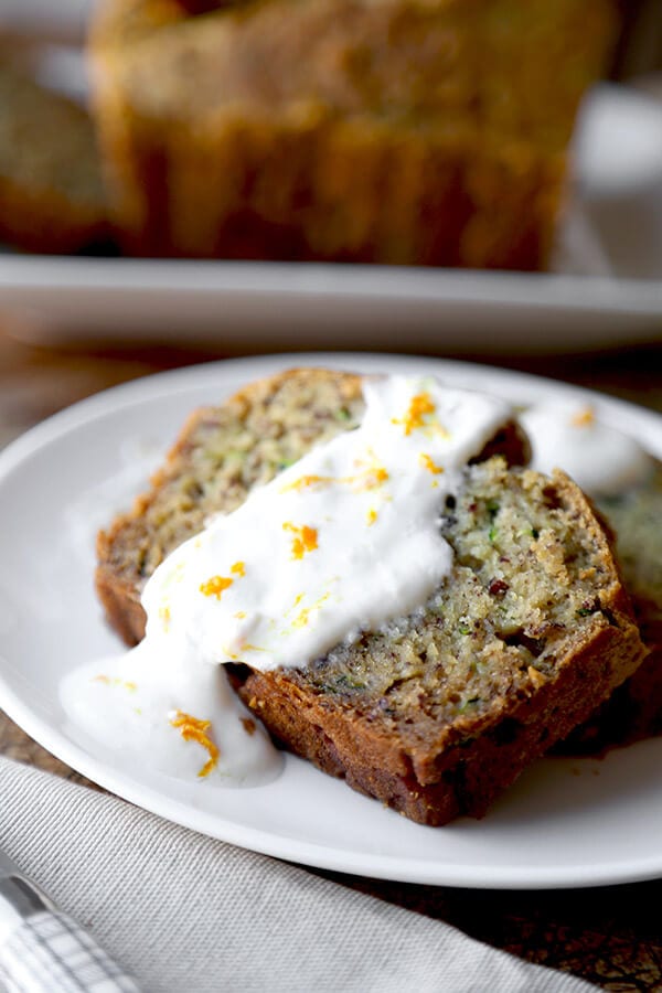 Gluten free zucchini bread - Serve this yummy gluten free zucchini bread as part of your Easter Sunday brunch this year! Topped with a honey orange yogurt sauce, it's the perfect balance of sweet and sour! Easy, gluten free, baking, recipe | pickledplum.com