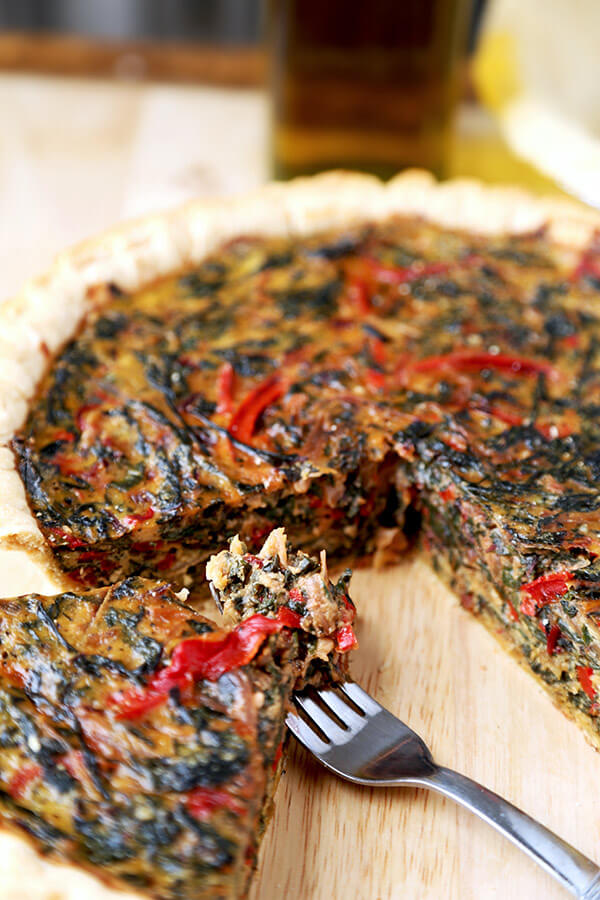 spring Swiss Chard Pie With Gruyère - Feed your family a healthy and beautiful spring Swiss Chard Pie With Gruyère for dinner tonight. Only 15 minutes to prep and ready to serve in less than an hour! Recipe, healthy, easy, quiche, tart, French, baking | pickledplum.com