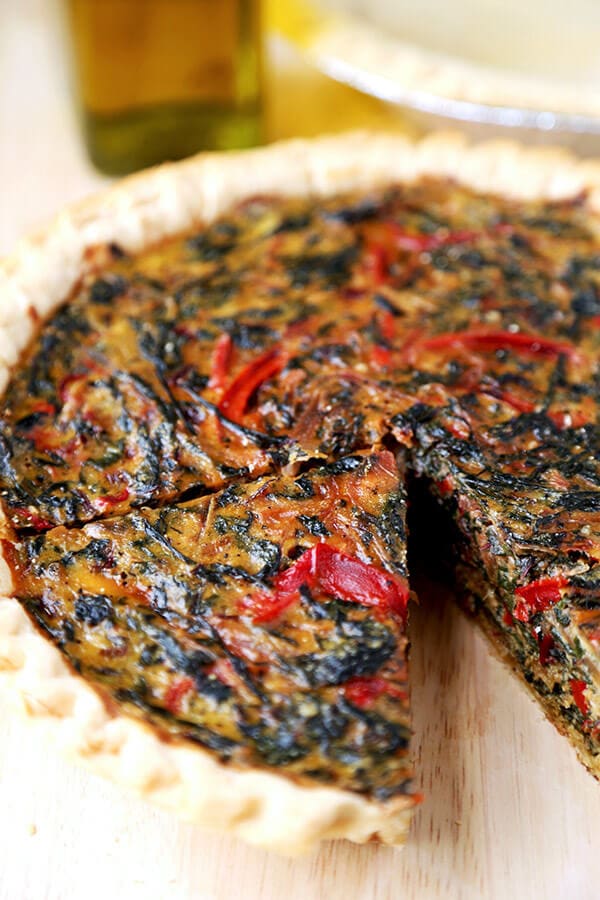 spring Swiss Chard Pie With Gruyère - Feed your family a healthy and beautiful spring Swiss Chard Pie With Gruyère for dinner tonight. Only 15 minutes to prep and ready to serve in less than an hour! Recipe, healthy, easy, quiche, tart, French, baking | pickledplum.com