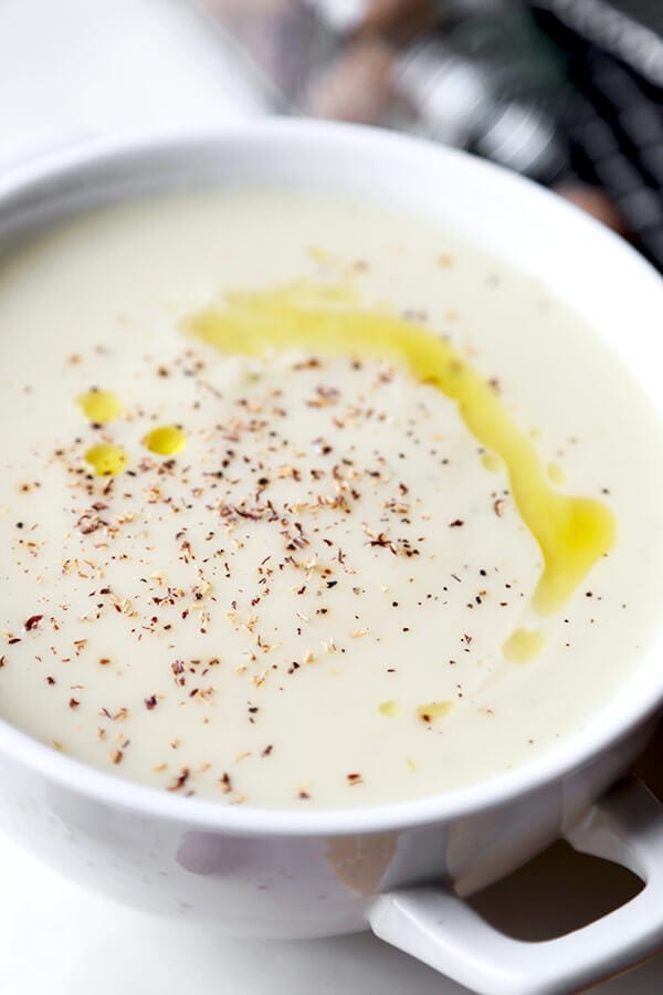 Healthier Cream Of Cauliflower Soup - An easy and Healthier Cream of Cauliflower Soup that tastes decadent, savory and naturally sweet. This delicious recipe won’t weigh you down! Recipe, Appetizer, Healthy, Gluten Free, Soup | pickledplum.com