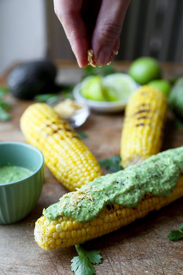 Grilled Corn On The Cob With Tomatillo Dressing - A tart, sweet and perfectly charred Grilled Corn on the Cob with Tomatillo Dressing Recipe, ready in 20 minutes, start to finish! Recipe, healthy, bbq, grilling, summer, vegetarian | pickledplum.com