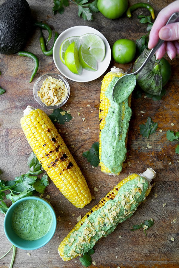 Grilled Corn On The Cob With Tomatillo Dressing - A tart, sweet and perfectly charred Grilled Corn on the Cob with Tomatillo Dressing Recipe, ready in 20 minutes, start to finish! Recipe, healthy, bbq, grilling, summer, vegetarian | pickledplum.com