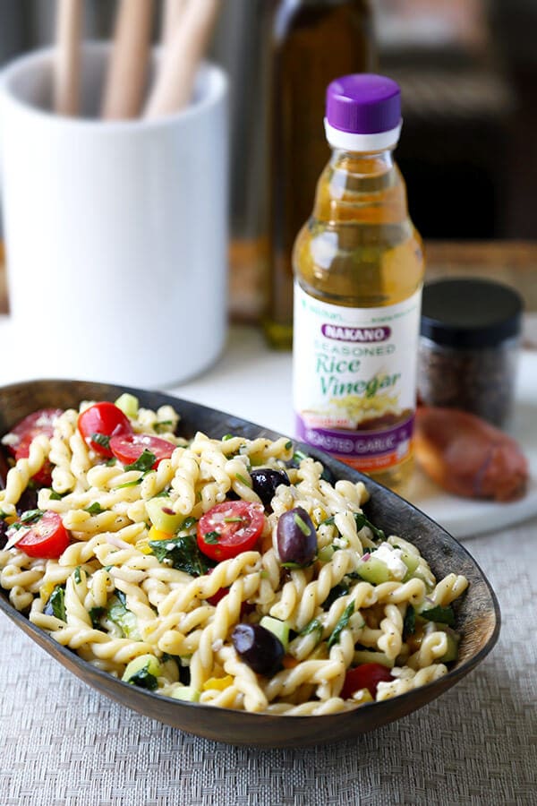 Greek Pasta Salad - This is a light, refreshing and tangy Greek pasta salad recipe packed with veggies for a wholesome meal! Ready in 25 minutes from start to finish. Recipe, salad, side, main, healthy, easy | pickledplum.com