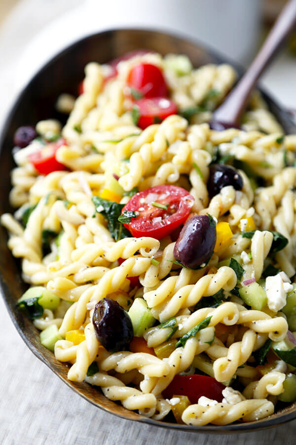 Greek Pasta Salad - This is a light, refreshing and tangy Greek pasta salad recipe packed with veggies for a wholesome meal! Ready in 25 minutes from start to finish. Recipe, salad, side, main, healthy, easy | pickledplum.com