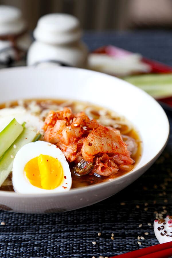 Shirataki Cold Noodle Soup - Healthy, refreshing and good for your bikini body! This ice cold shirataki noodle soup topped with sweet pear and spicy kimchi is only 222 calories per servings and filling enough to be eaten as a meal! Recipe, soup, low calories, diet, weight loss, noodles, healthy, noodle soup | pickledplum.com