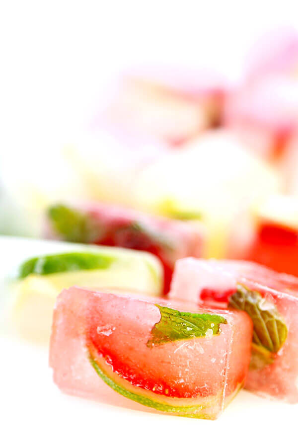 Fruity Ice Cubes - Chilly, citrus filled summer relief is the name of the game with this super simple Fruity Ice Cubes Recipe. Recipe, drinks, fruit, healthy, beverage | pickledplum.com